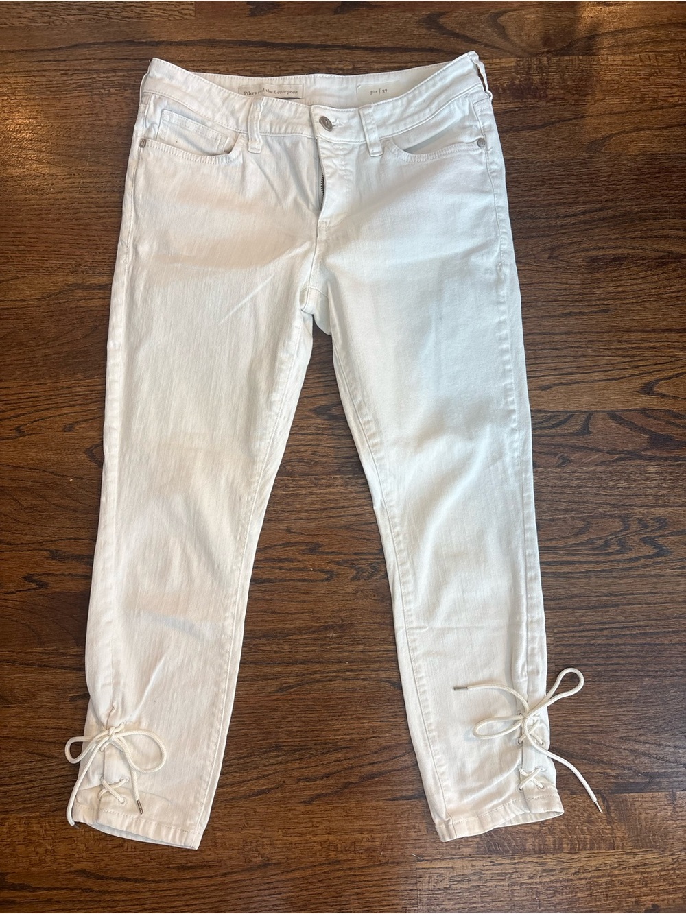 Pilcro and the Letterpress White capri's cropped skinny jeans with tie detail